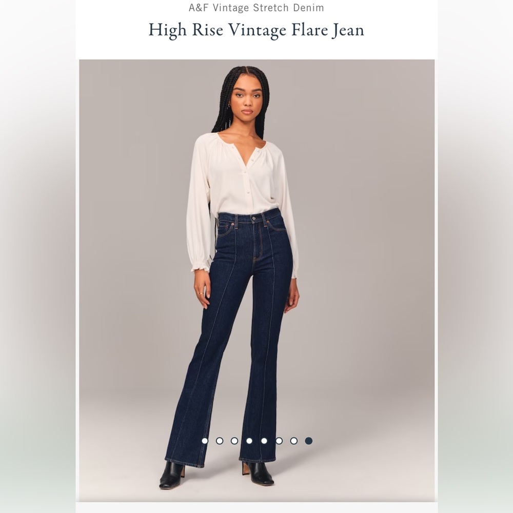 AF High Rise Vintage Flare Jeans. Size 27. Super dark with pin tuck seam.